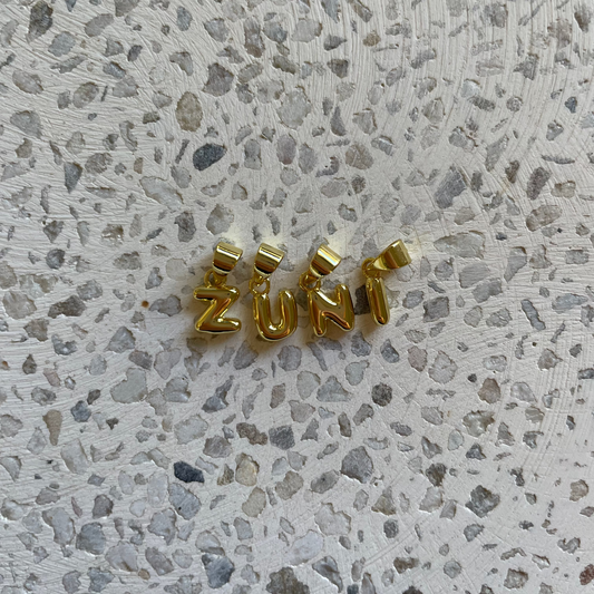 INITIAL CHARM